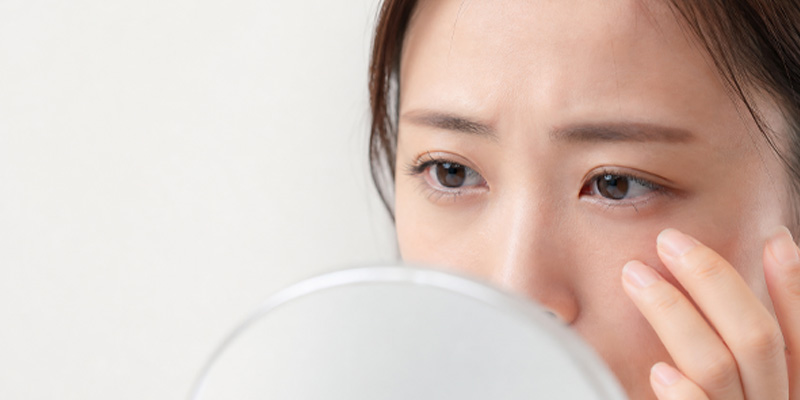 二重ラインが浅く見える原因を診察するイメージ